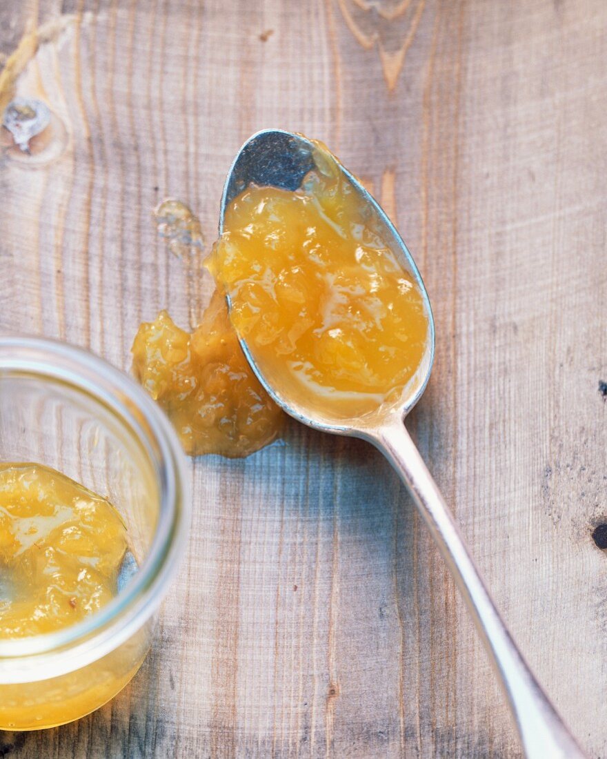 Pineapple and fennel jam on a spoon and in a jar