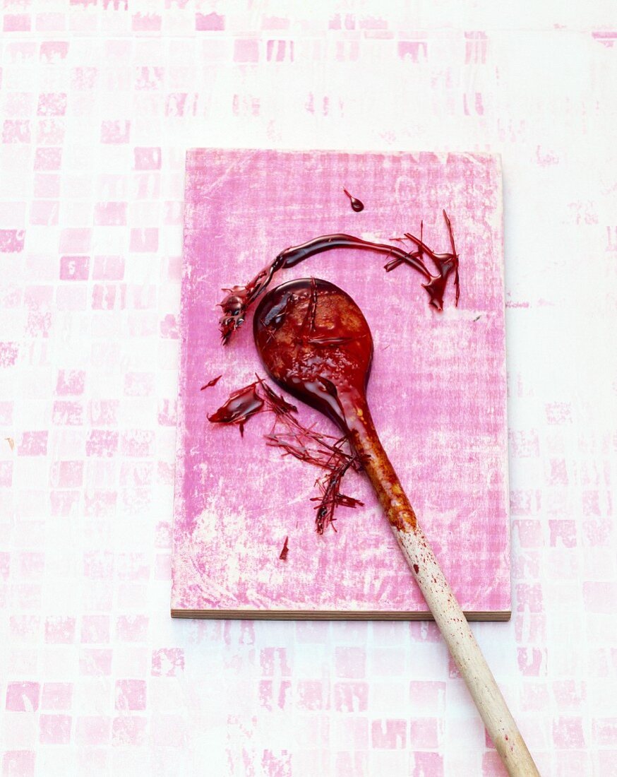 Rose brittle with a wooden spoon