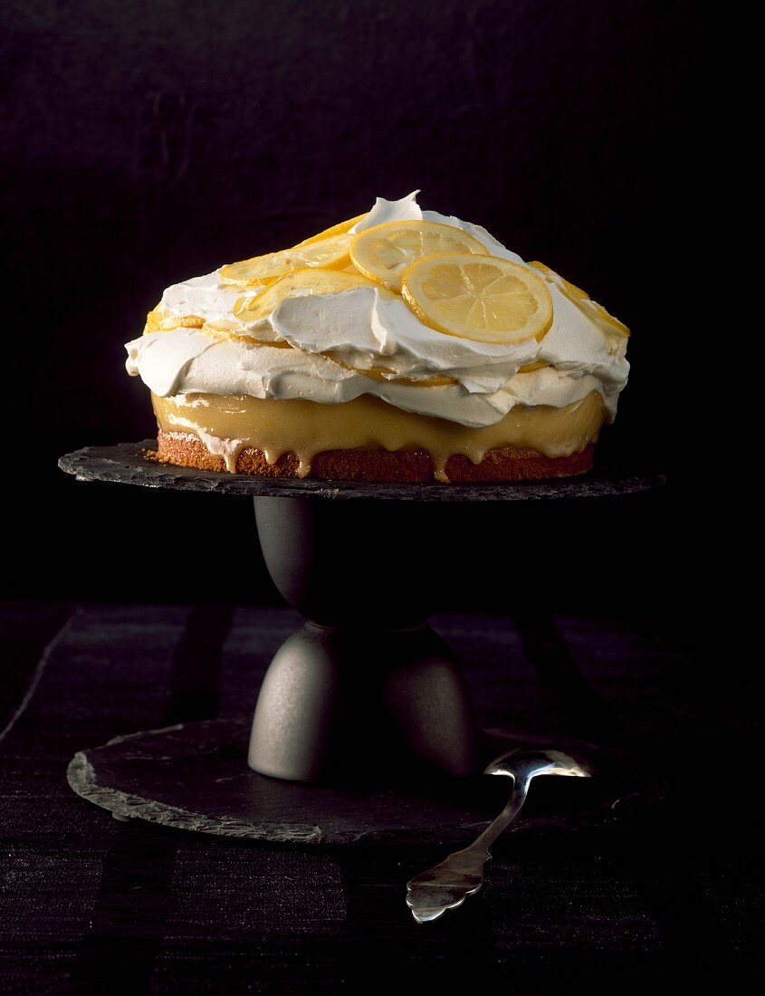 A lemon tart topped with cream