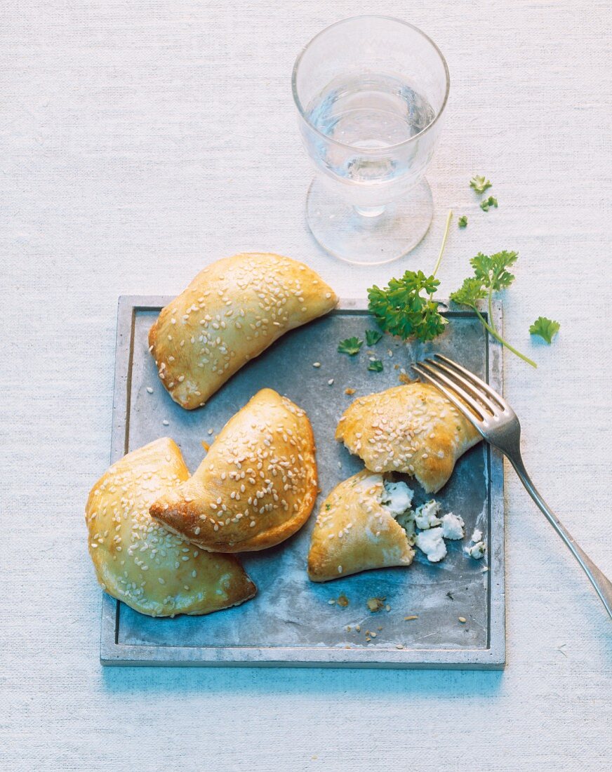 Puff pastry pockets with feta cheese and sesame seeds
