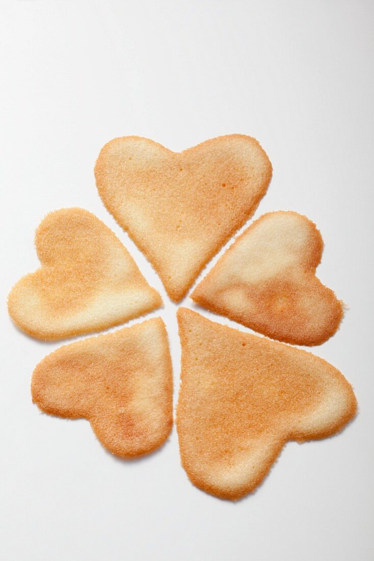 A clover leaf made of heart-shaped biscuits
