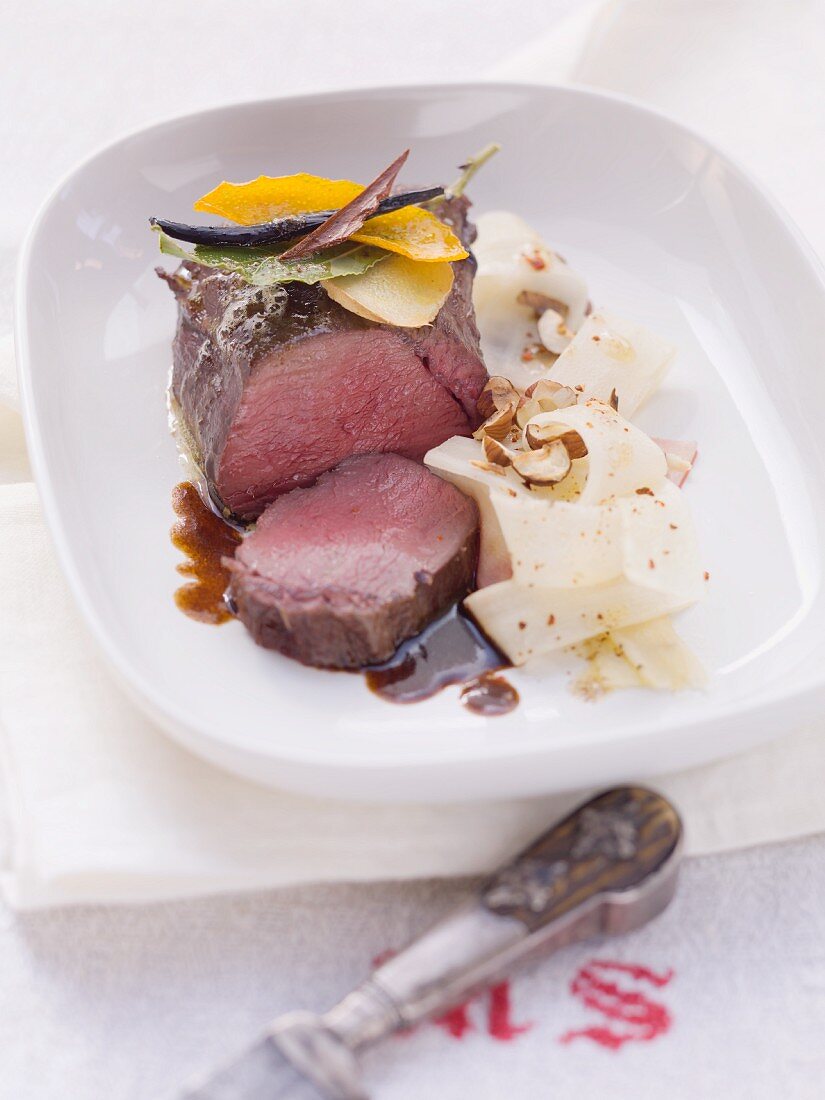 Roast saddled of venison with black salsify pasta