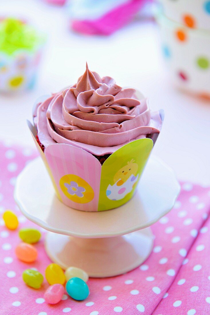 A pink frosted cupcake for kids