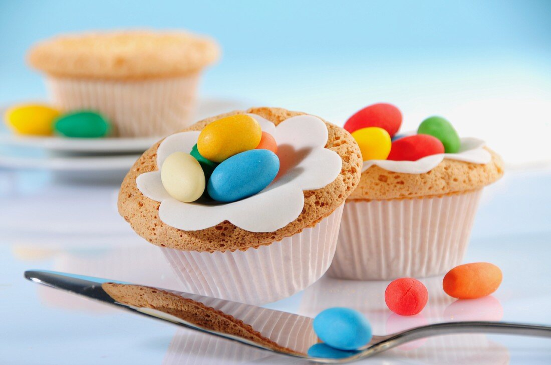 Cupcakes decorated with colourful sugar eggs