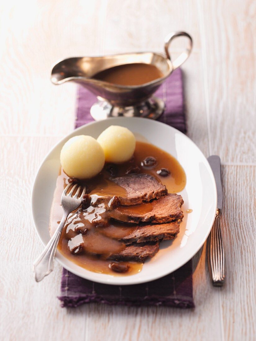 Sauerbraten (marinated pot roast) with potato dumplings