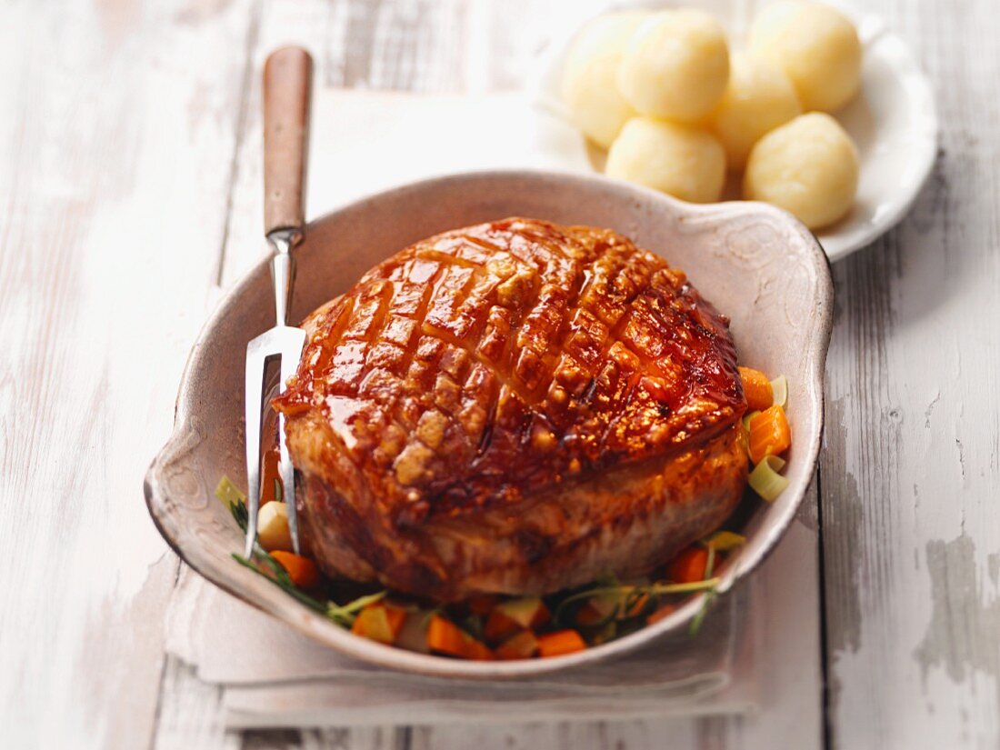 Crispy roast pork with potato dumplings