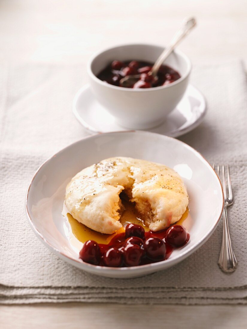 A yeast cumpling, Saxony, with cherry compote