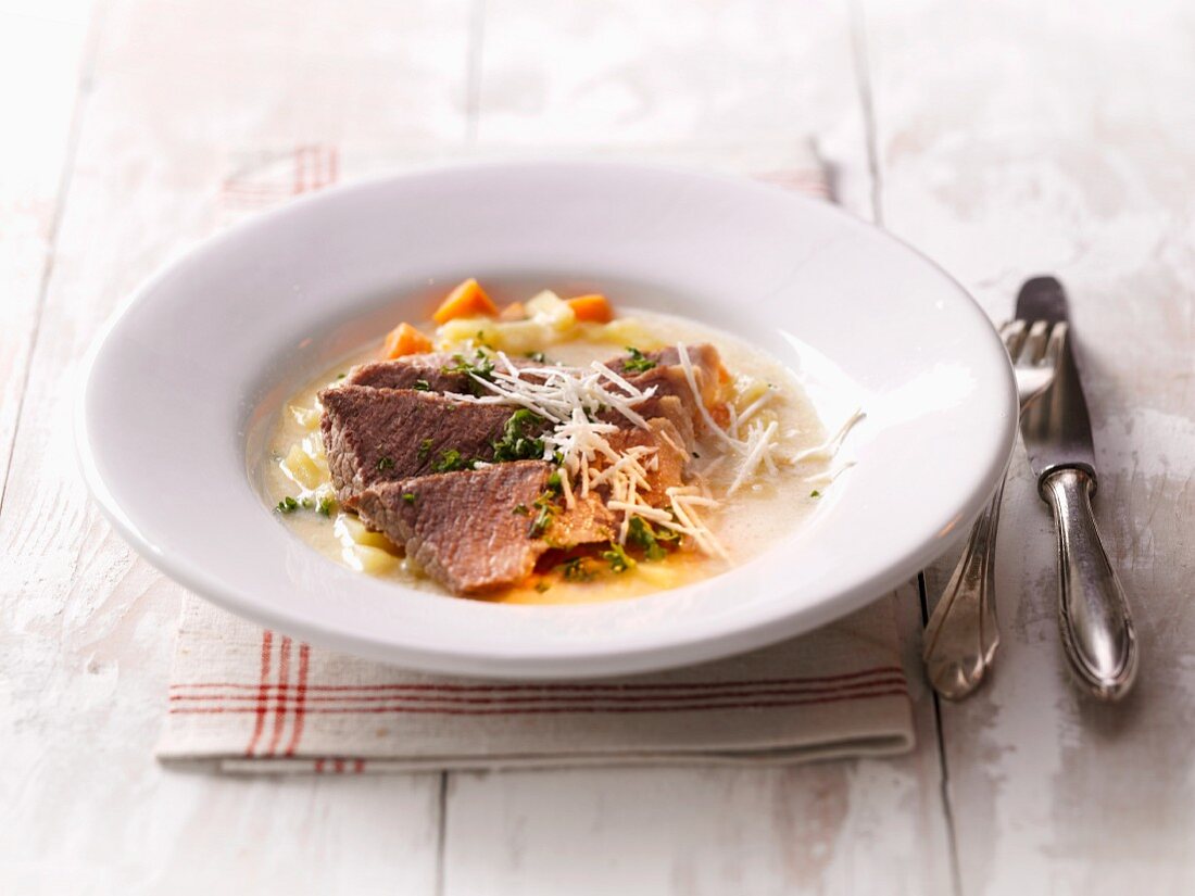 Boiled beef with vegetables and horseradish