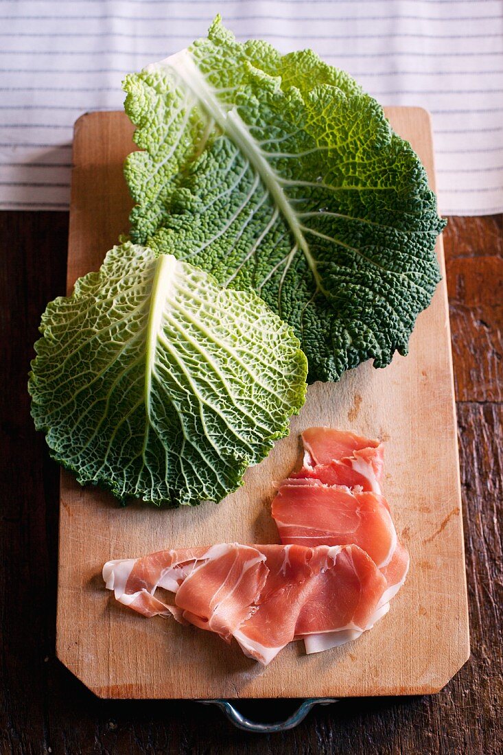Savoy cabbage leaves and Parma ham