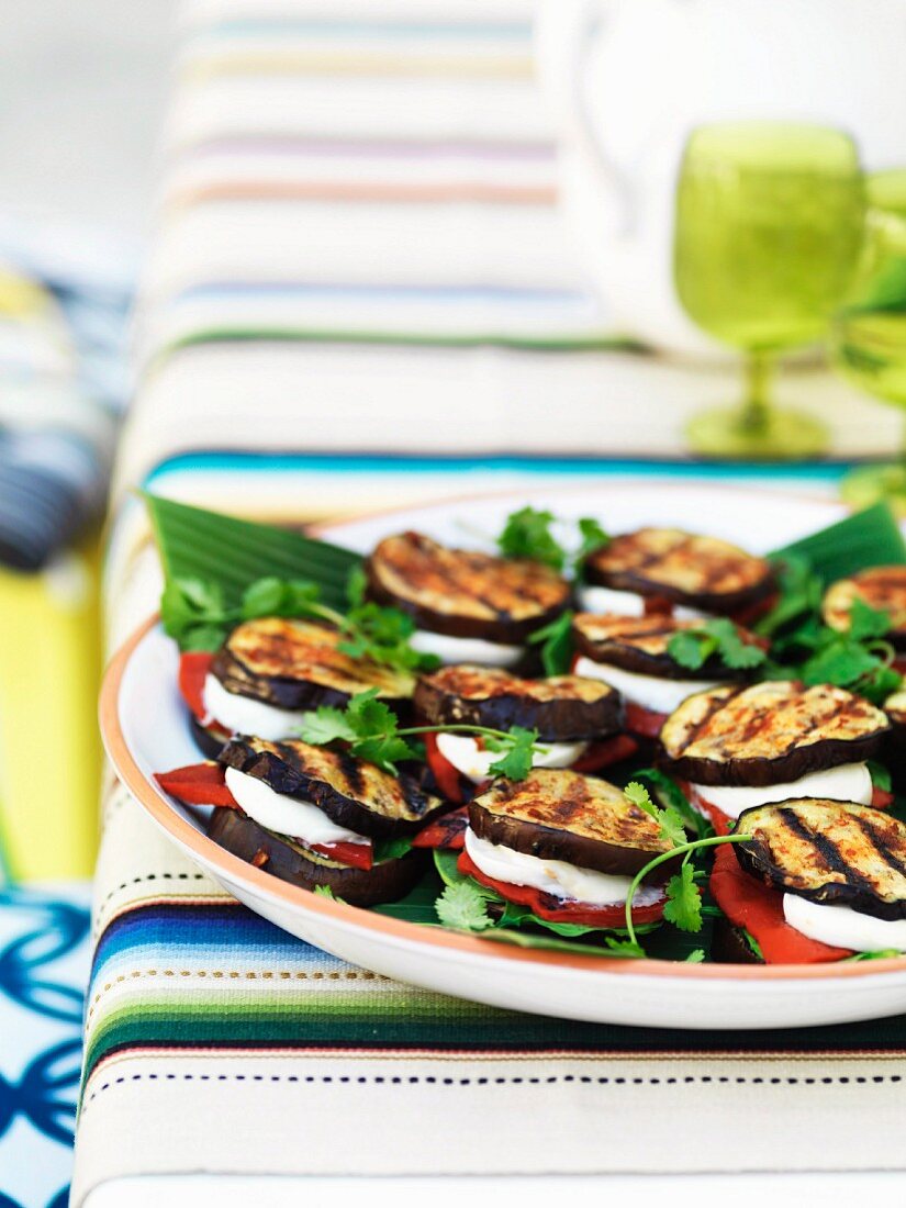 Aubergine quesadillas with spinach, mozzarella and roasted peppers