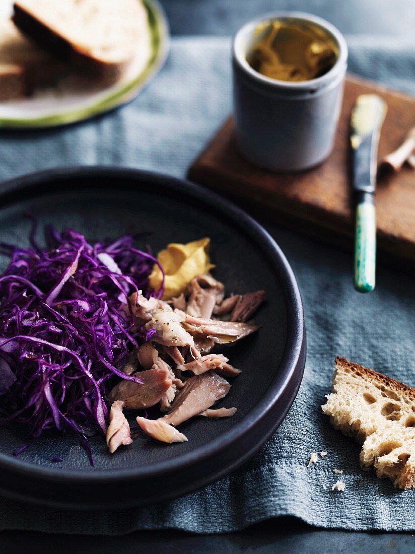 Sour pickled pork with a raw vegetable salad