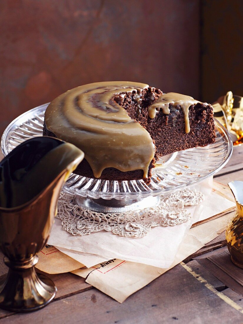 Chocolate cake with caramel glaze, sliced