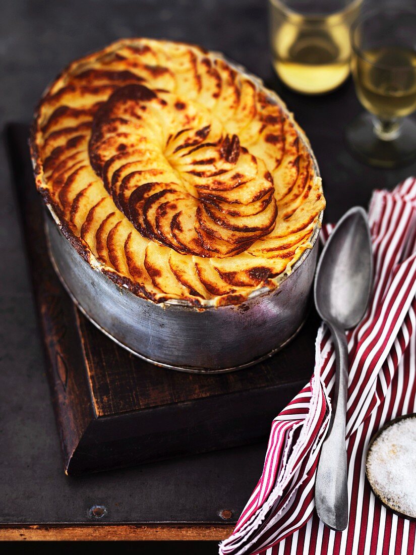 A meat and fish pie with a potato lid