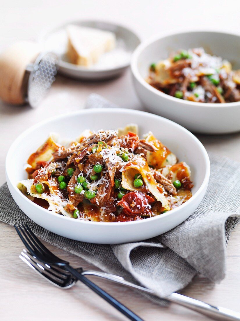 Bread maltagliati with lamb and peas