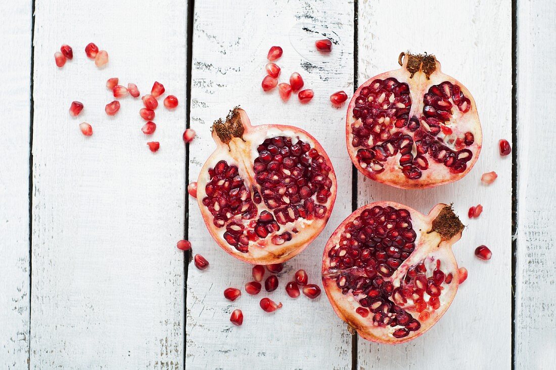 Pomegranate halves and seeds