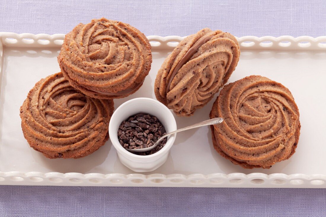 Piped chocolate biscuits with filling