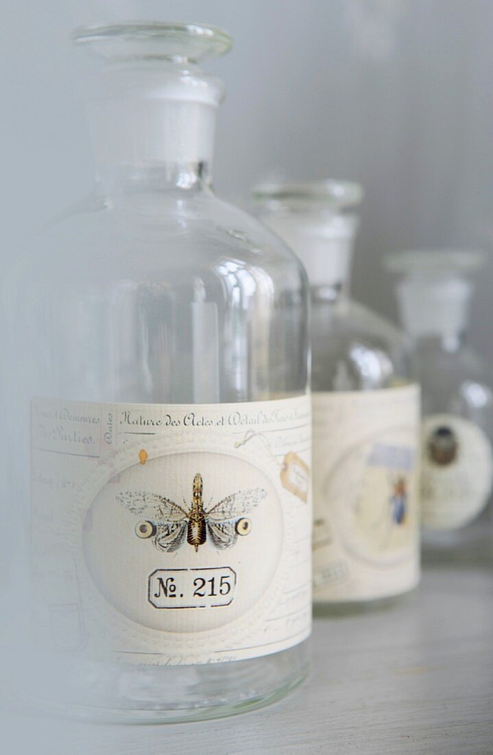 Empty apothecary's bottles with labels