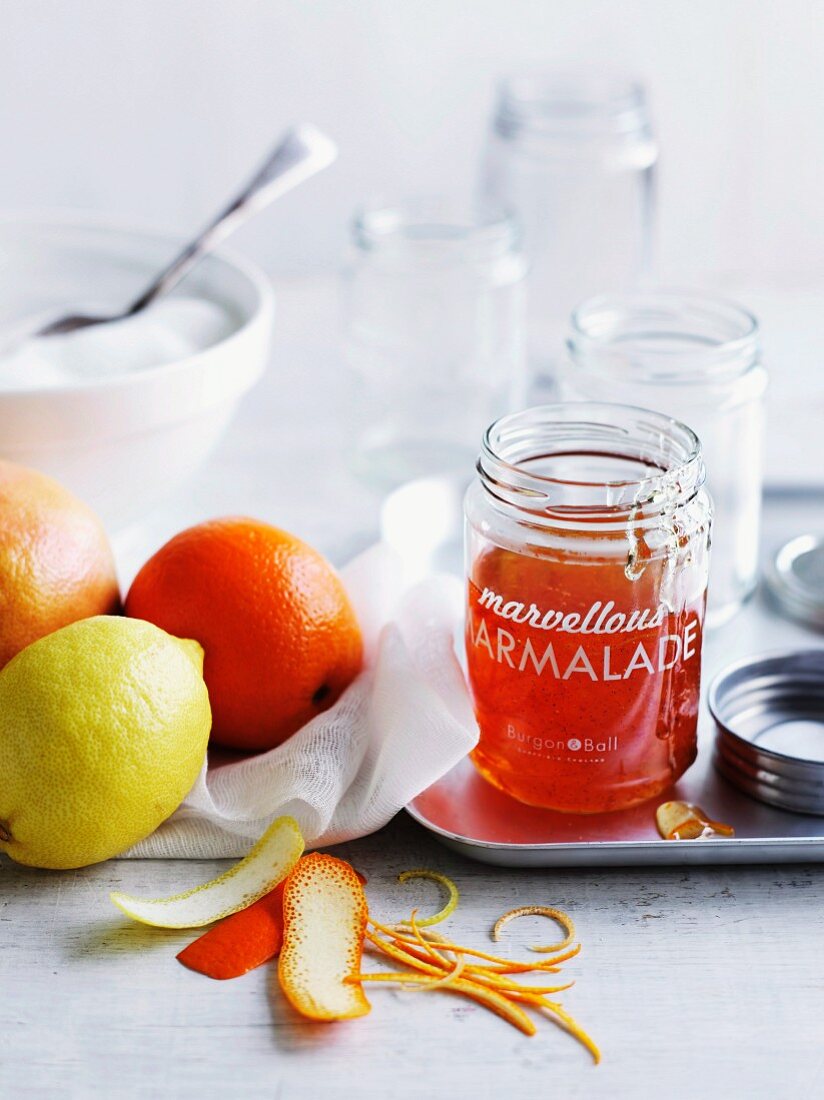 A jar of marmalade with lemons and grapefruit