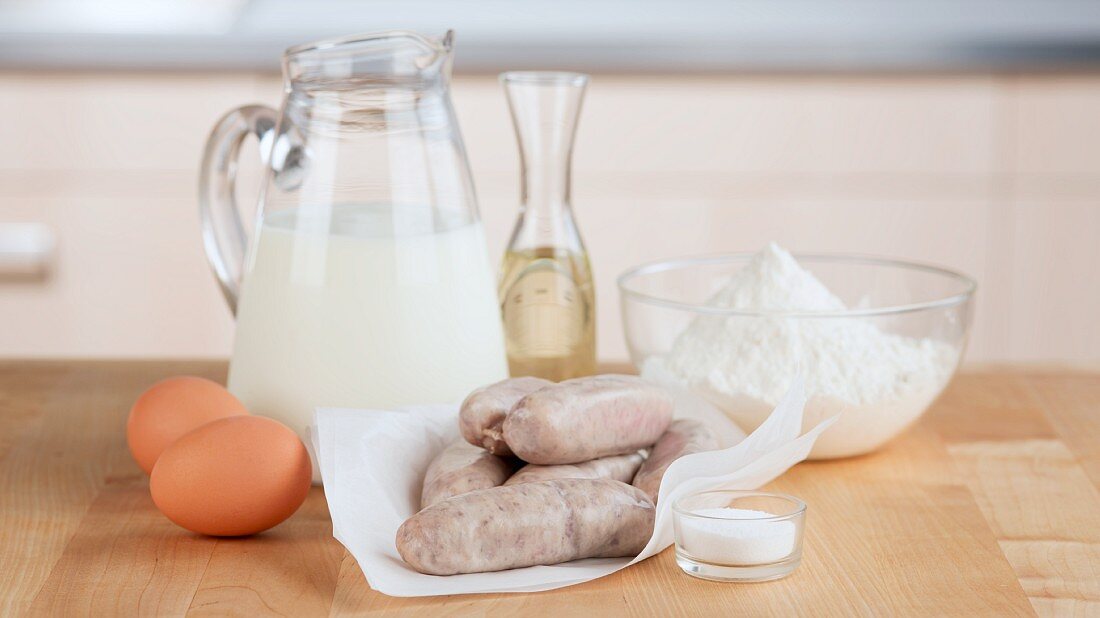 Ingredients for toad in the hole (sausages in batter, England)