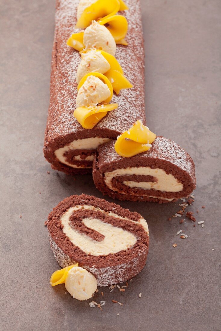 Chocolate roulade filled with mango cream