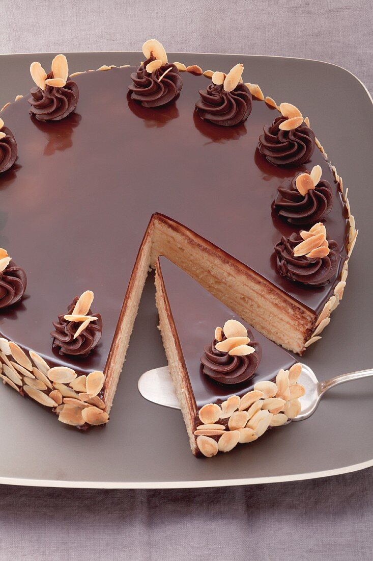 A marzipan and almond layer cake with chocolate glaze (Herrentorte)