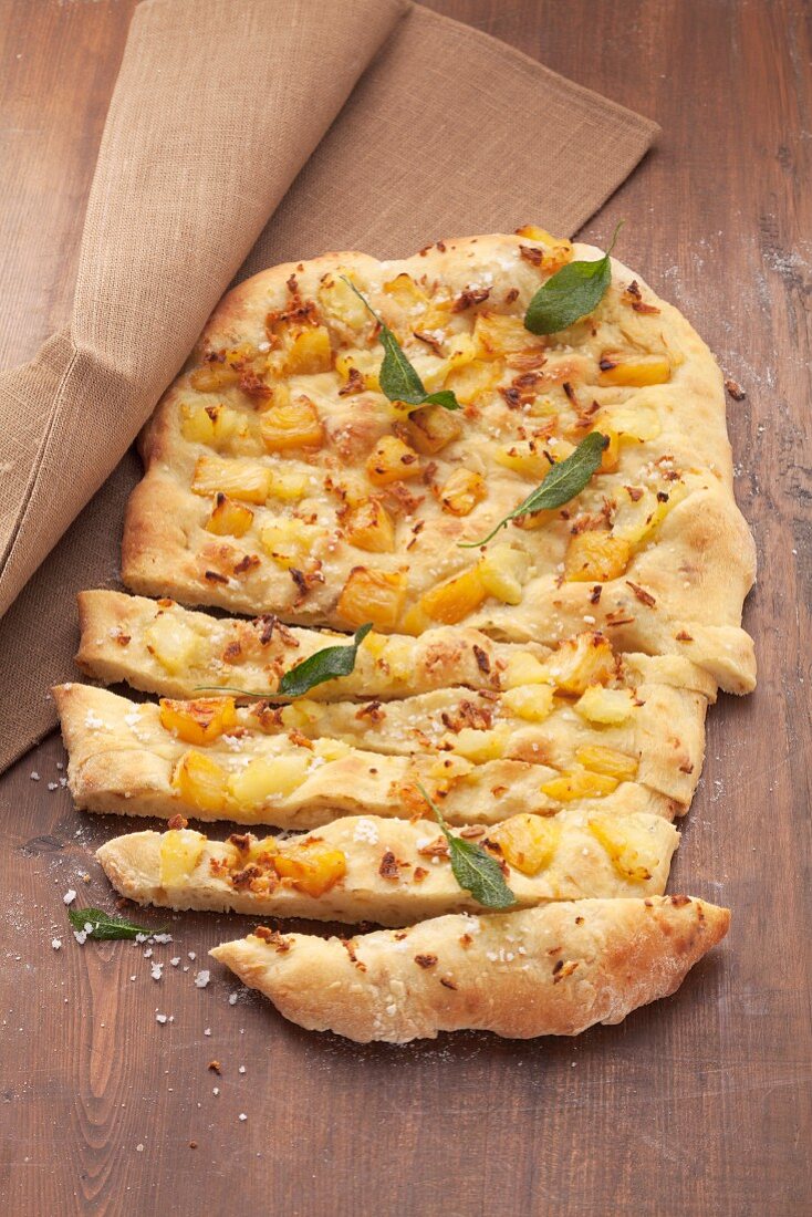 Potato flatbread with pineapple, onions and vanilla flavouring