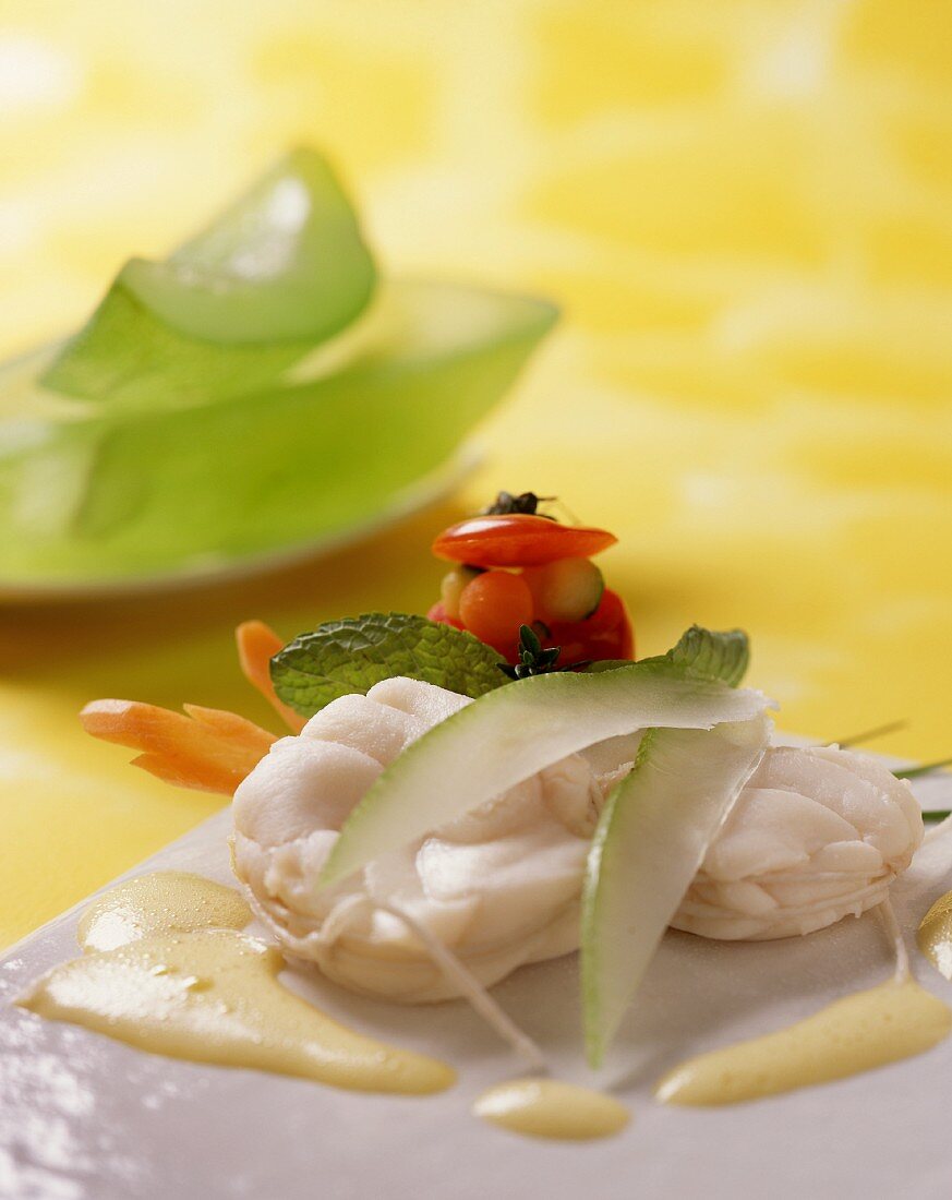 Monk fish with yoghurt sauce and slices of citron