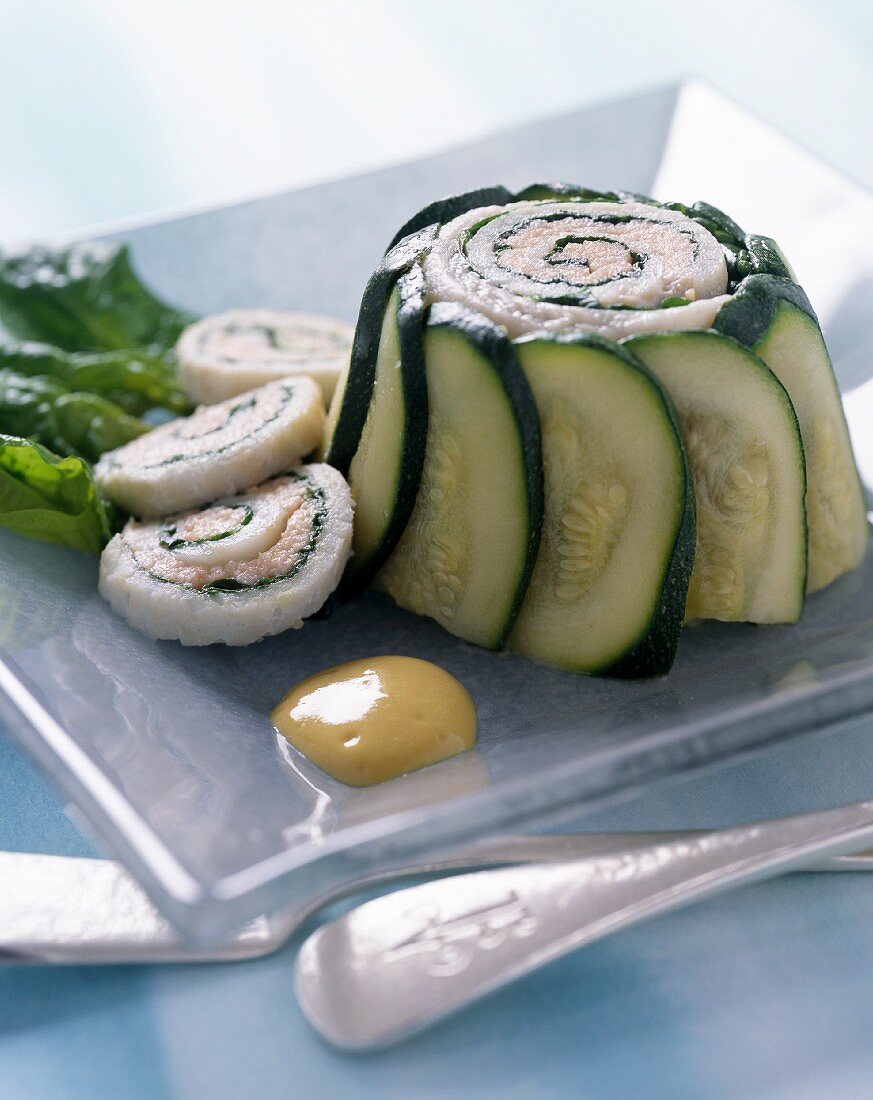 Individual sole roulette wrapped in courgette slices