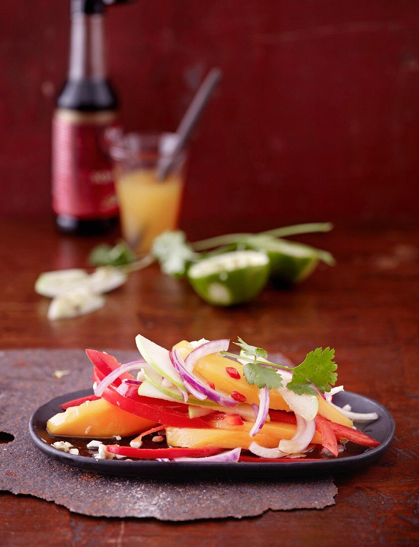 Mango salad with pepper and coriander
