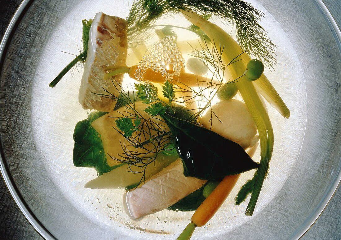Clear Fish Soup with Fish Fillet, Green Beans, Carrots, Fennel, Celery, Spinach, Dill and Parsley