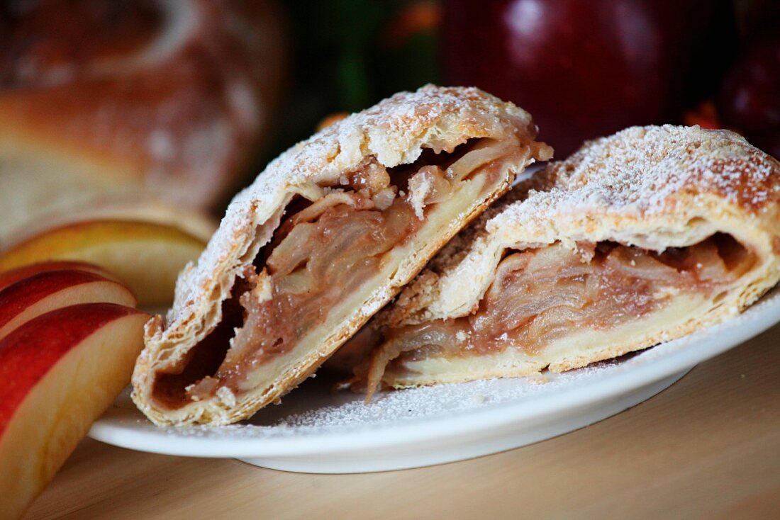 Halved Apple Turnover Dusted With Powdered Sugar