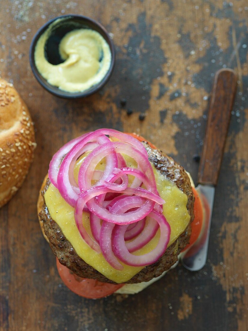 Cheeseburger with Pickled Onions; Top Bun Removed; From Above