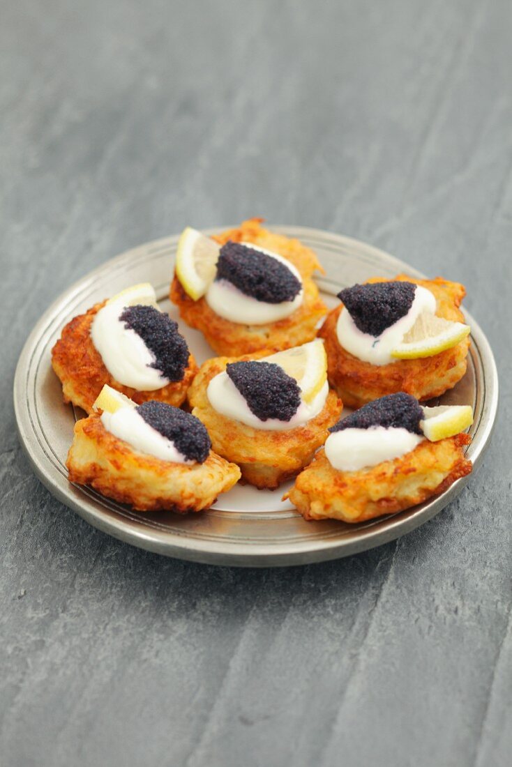 Potato fritters with caviar