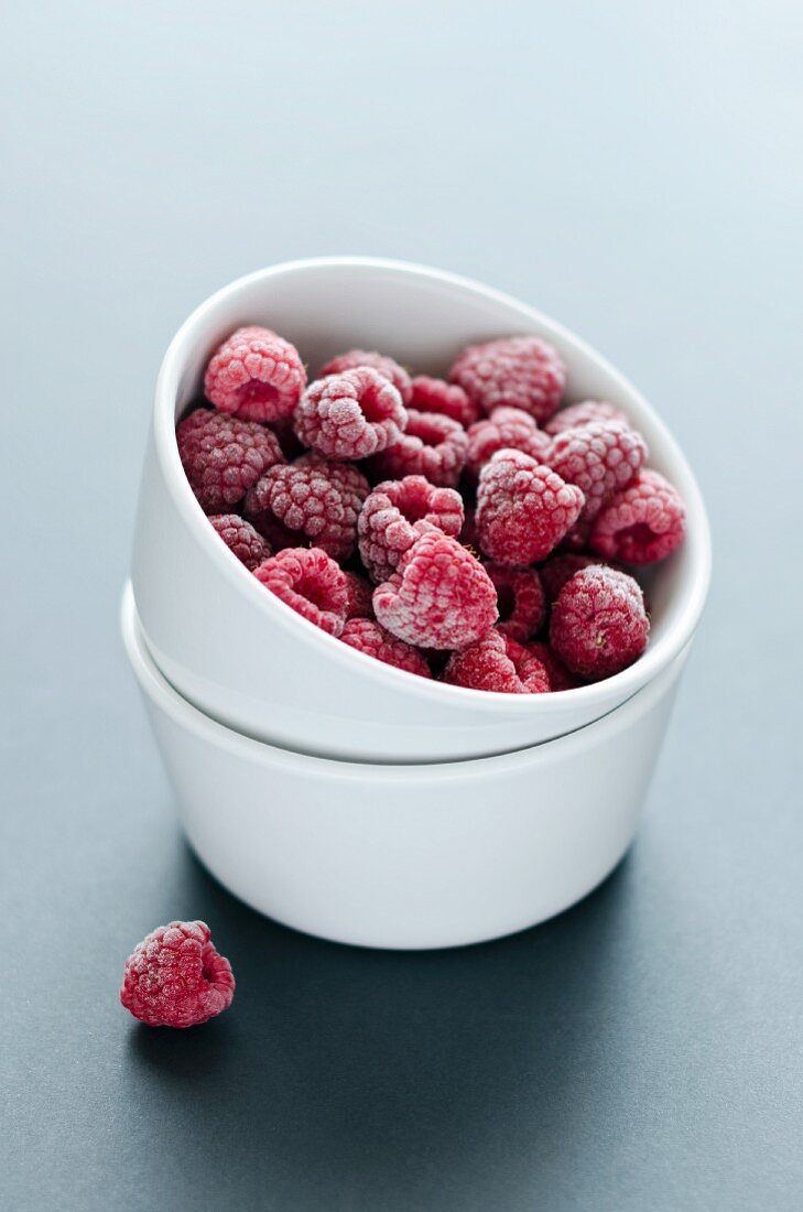 A ramekin of frozen raspberries