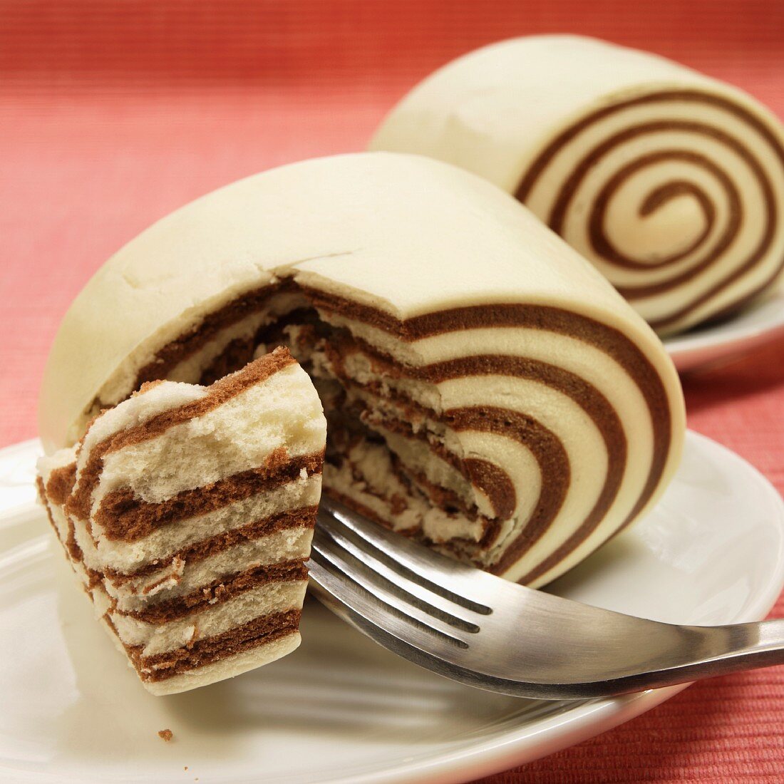 Chinese Chocolate Swirl Mantou with a Piece on a Fork