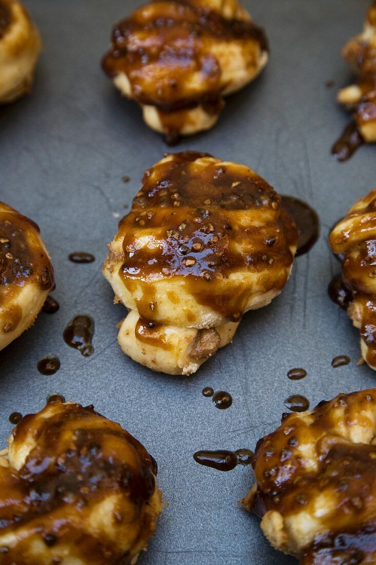 Cardamom Buns on a Baking Sheet