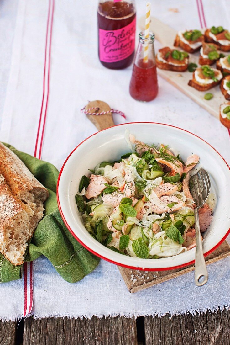 Salmon salad with pickled gherkins, fennel and mint, for a picnic