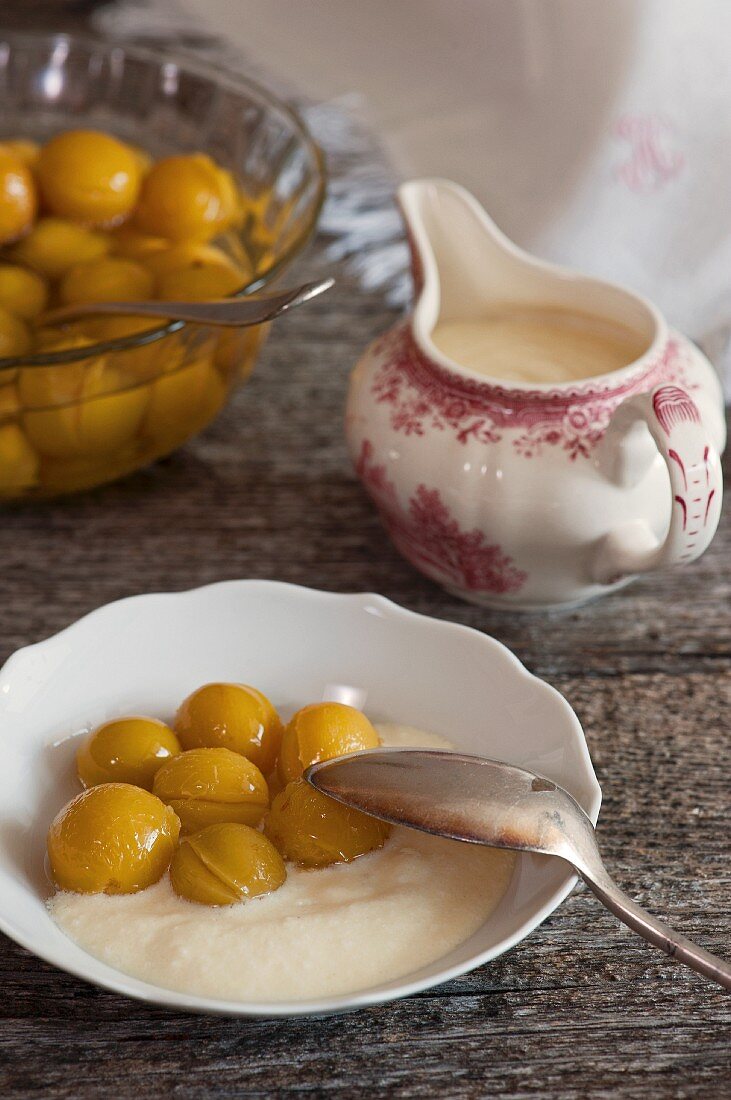 A sweet honey and milk sauce with stewed Mirabelle plums