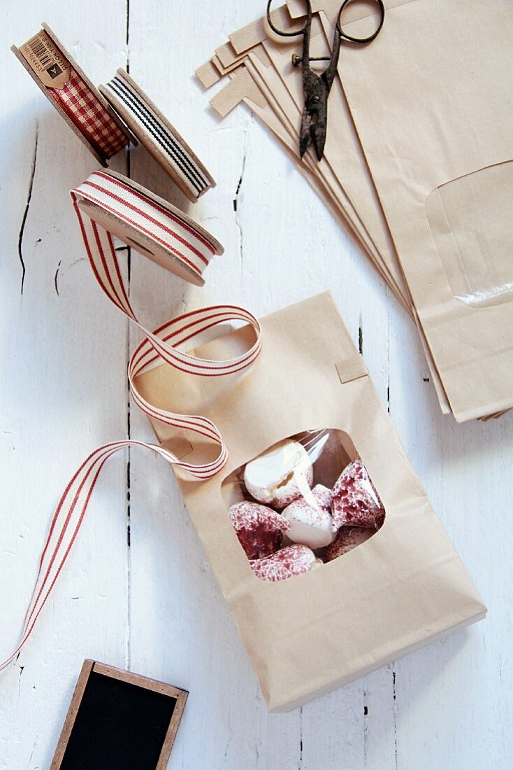 A gift bag of raspberries coated in meringue