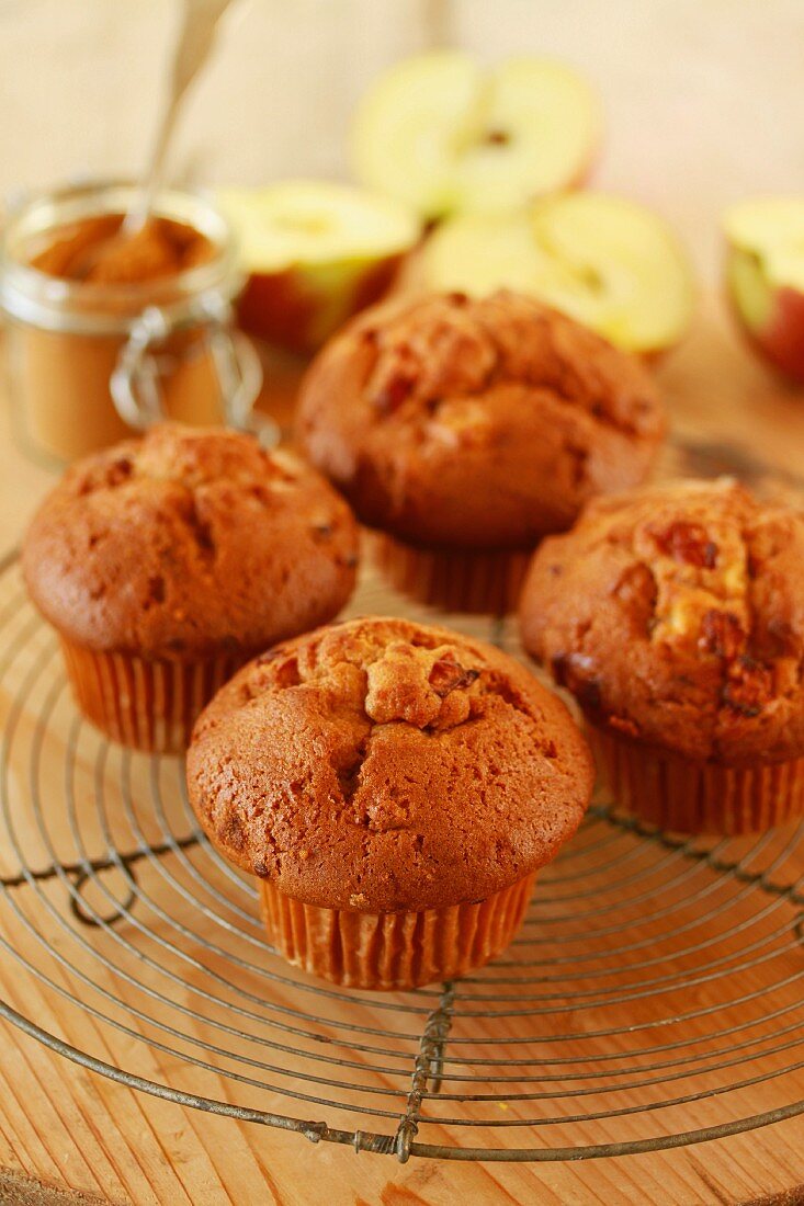 Apple and cinnamon muffins on a cooling rack