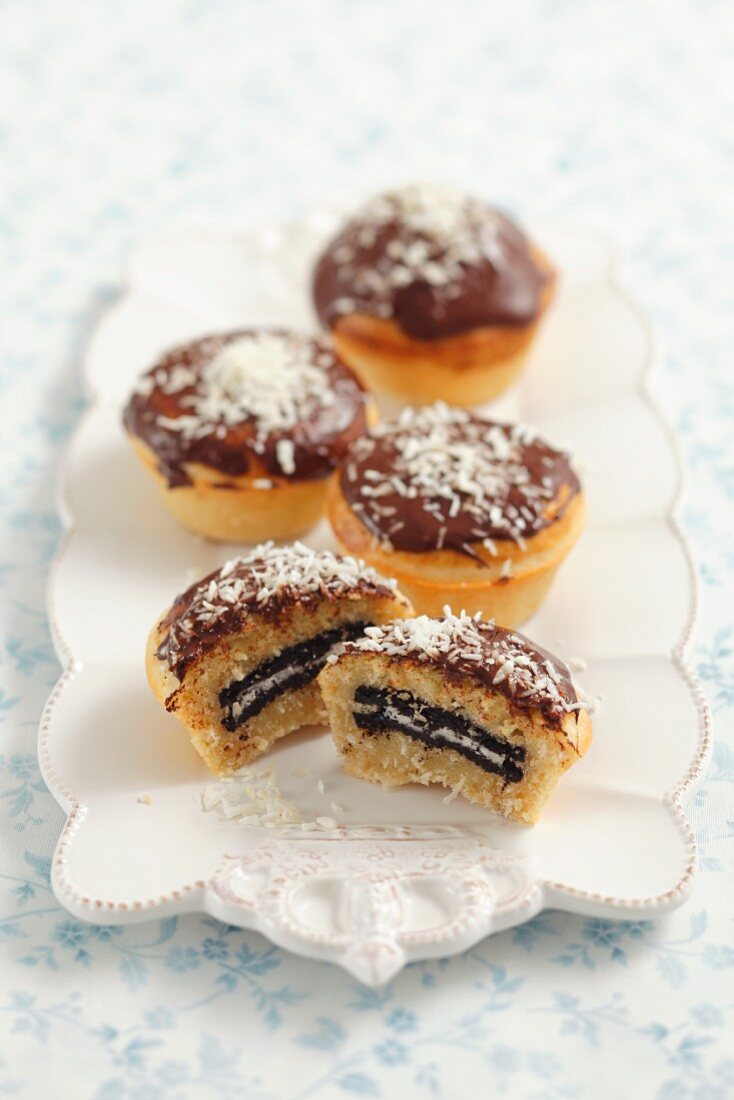 Coconut muffins filled with chocolate biscuits