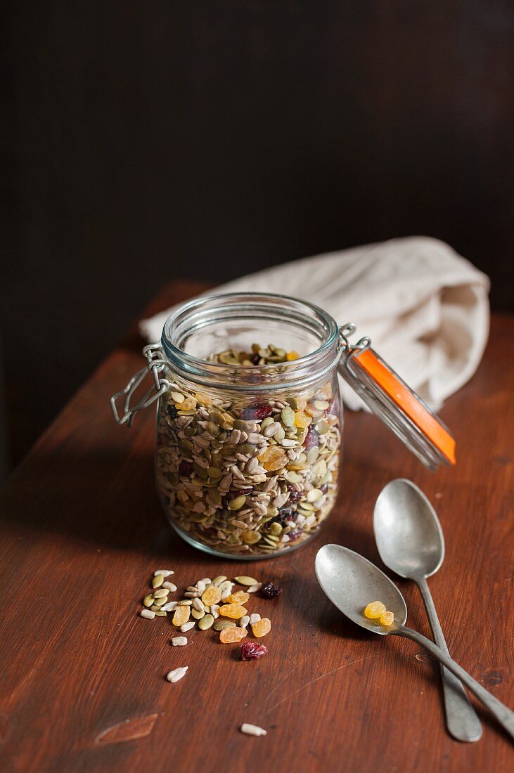 Cereal and dried fruit in a storage jar