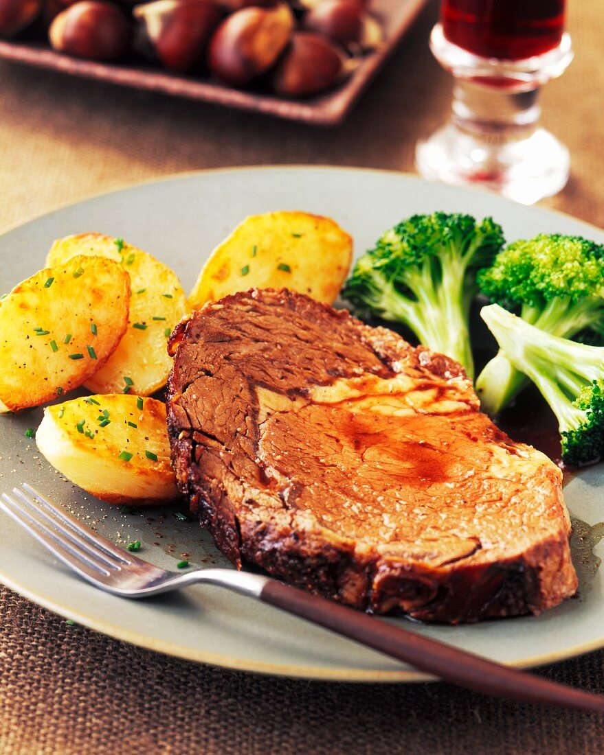 A Slice of Roast Beef with Broccoli and Roasted Chive Potatoes