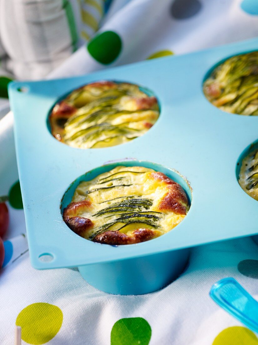 Mini courgette clafoutis in a muffin tin