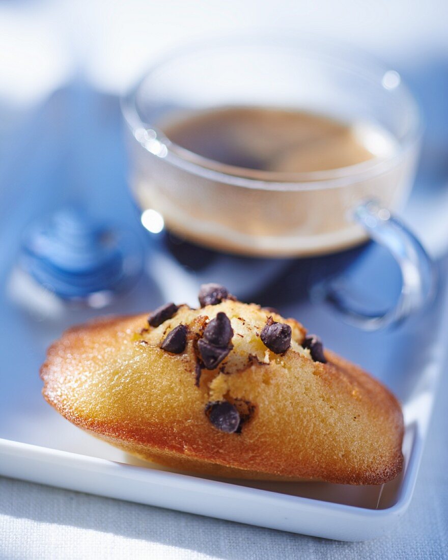 Chocolate chip madeleines with a cup of coffee