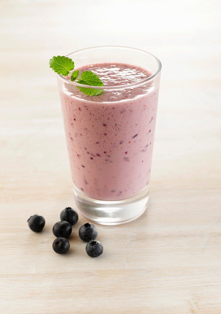 Blueberry smoothie with mint leaves