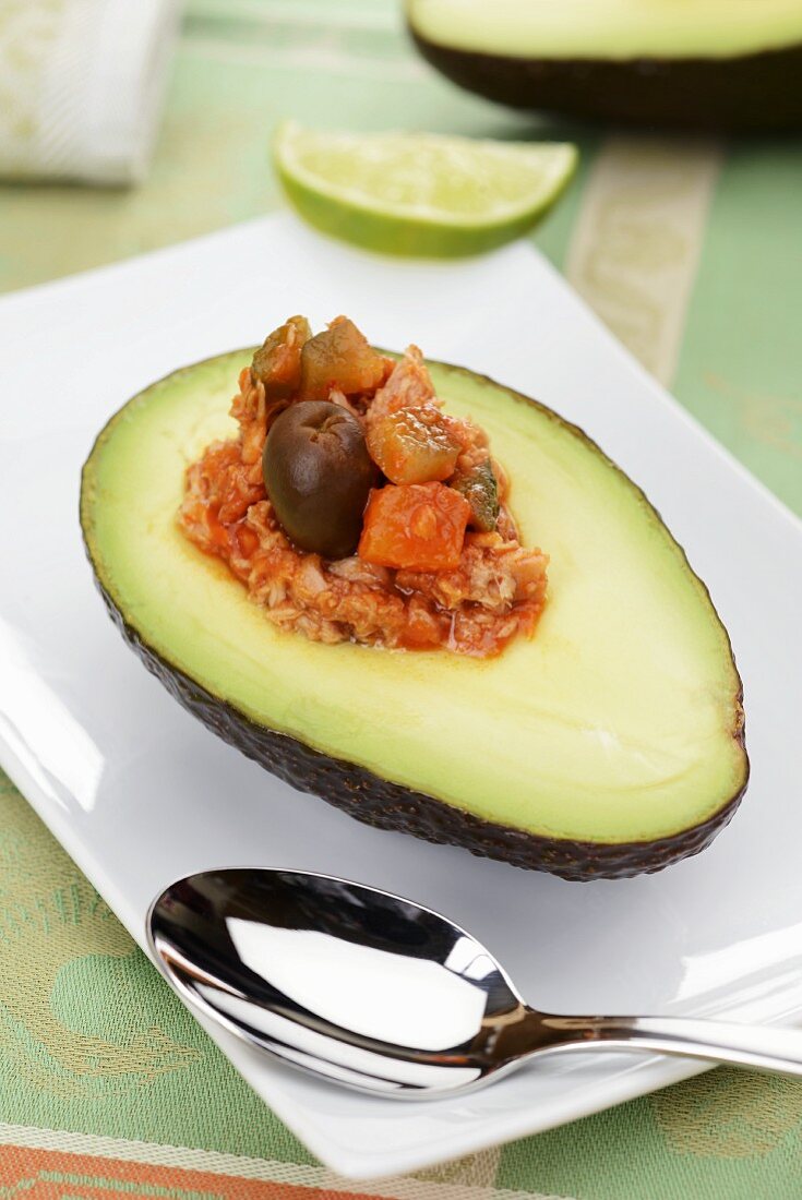 Avocado stuffed with tuna and olives