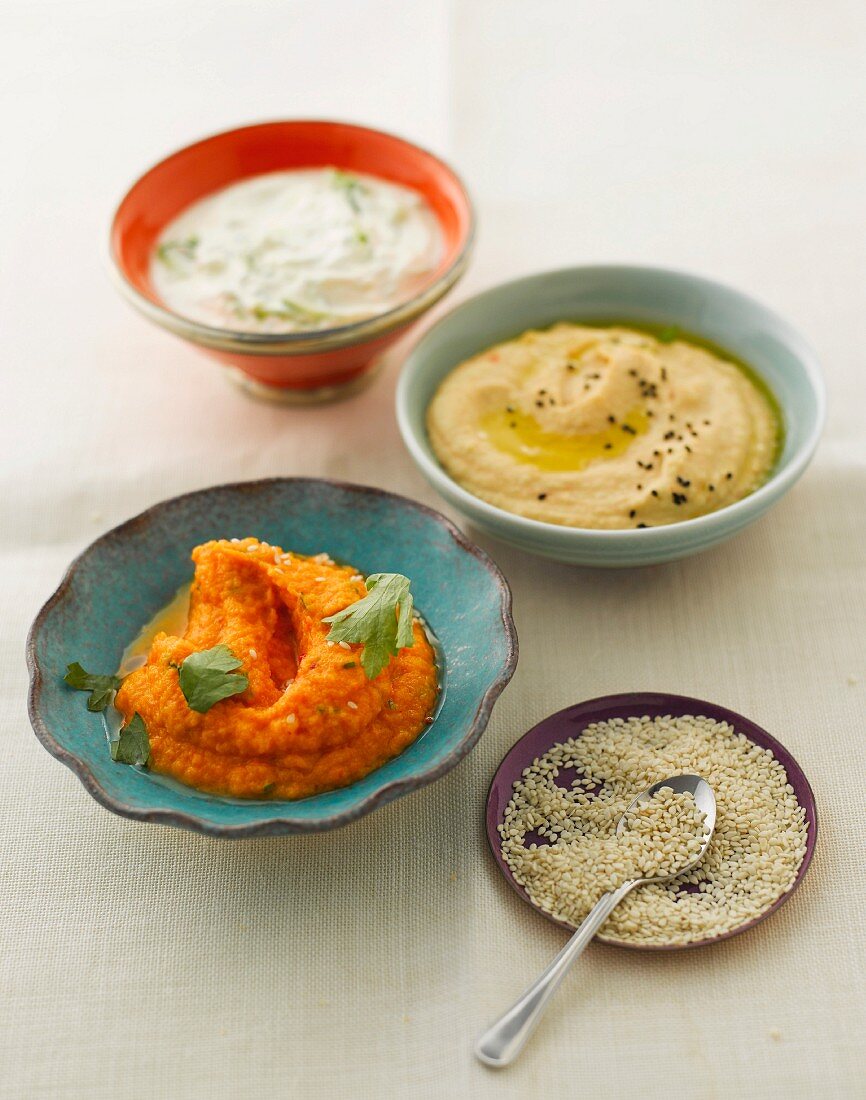 Assorted dips with sesame seeds