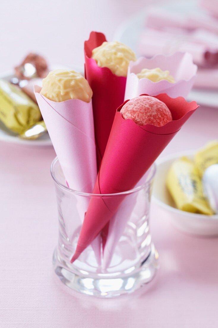 Home-made paper cones filled with chocolates