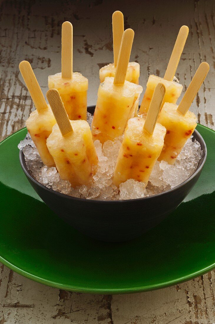 Home-made pineapple ice lollies